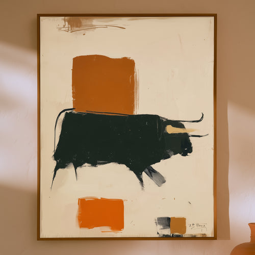 An abstract framed painting featuring a stylized black bull silhouette with orange rectangular blocks and a cream background, hung on a warm beige wall.
