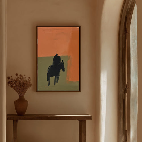 Framed Crossing horse and rider print above a wooden console in a warm neutral interior